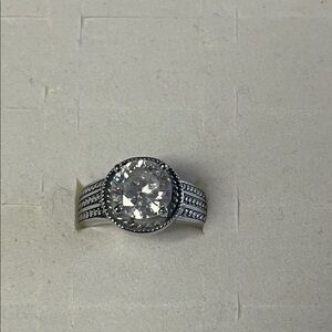 Elegant Silver Tone Ring with Clear Gemstone